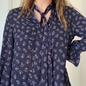 Women’s blue blouse with flower print